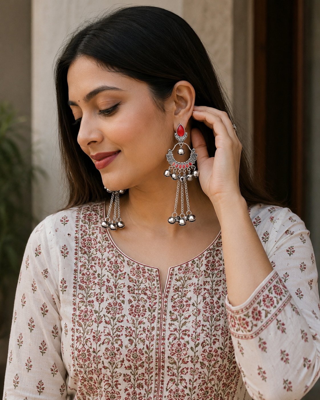 Beautiful silver Kashmiri jhumka earrings styled with printed kurti for elegant ethnic look