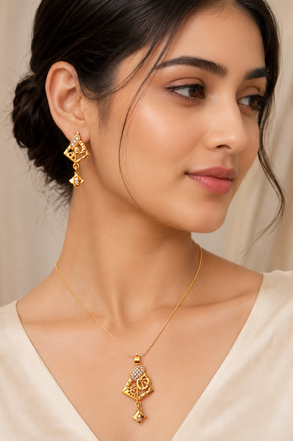 Gold Crystal Pendant Set Gold crystal pendant set with earrings