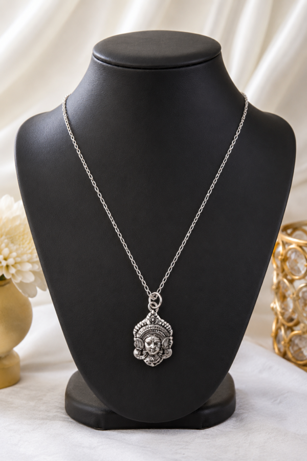 Traditional Silver Finish Mata Locket Elegant Religious Pendant Necklace crafted with intricate Mata face detailing and silver finish. Stylish Women's Jewellery for festive and spiritual occasions.