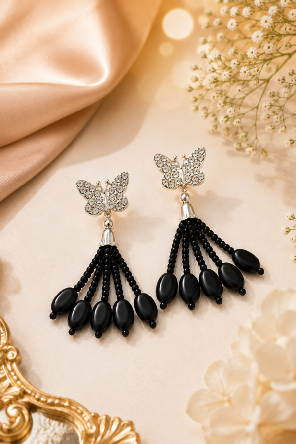 Black Butterfly Beaded Drop Earrings Black butterfly beaded drop earrings with cascading black beads