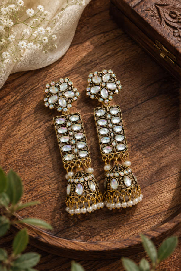Traditional Gold Tone Jhumka Earrings Traditional gold tone jhumka earrings with pearl-style hangings