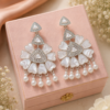 Designer Floral Pearl Drop Earrings Designer floral earrings with white petal detailing and pearl drops