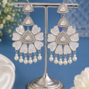 Floral pearl drop earrings with white petal and sparkling detailing