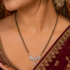 : AD Floral Pendant Mangalsutra for Women AD mangalsutra with floral pendant and pink centre accent