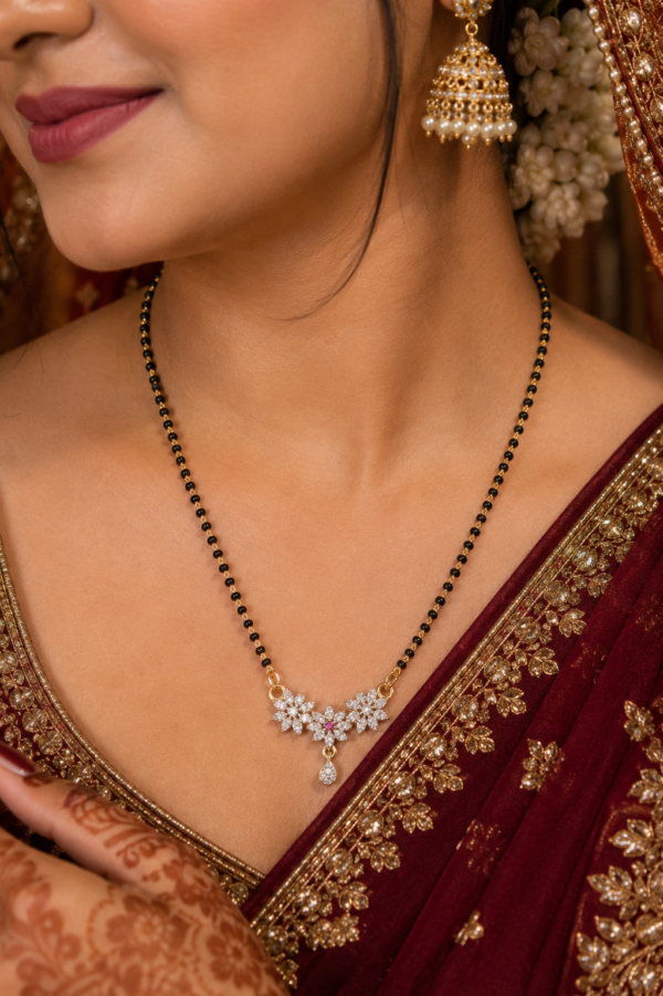 : AD Floral Pendant Mangalsutra for Women AD mangalsutra with floral pendant and pink centre accent