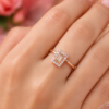 Rose Gold Tone Green Centre Ring Rose gold tone ring with elongated green centre and decorative stone accents