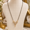 AD Black Beaded Floral Mangalsutra AD black beaded mangalsutra with gold floral pendant