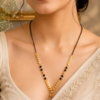 Black Beaded Mangalsutra for Women Black Beaded Mangalsutra with gold-tone leaf pattern