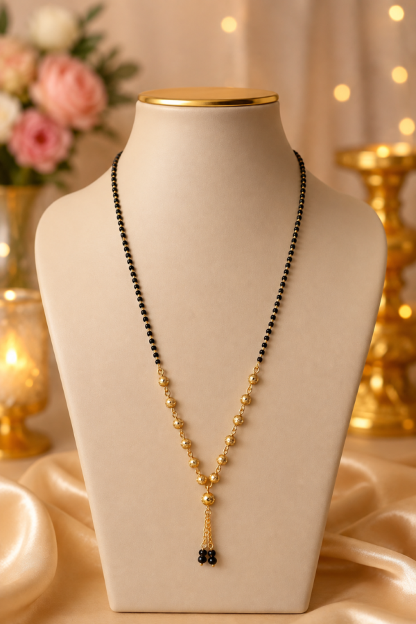 Y Shape Mangalsutra Y shape mangalsutra with black beads and gold-tone centre design