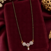 Black Beaded Floral Designer Mangalsutra Black beaded designer mangalsutra with floral stone pendant