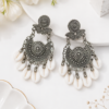 Floral silver drop earrings with white hanging shell details