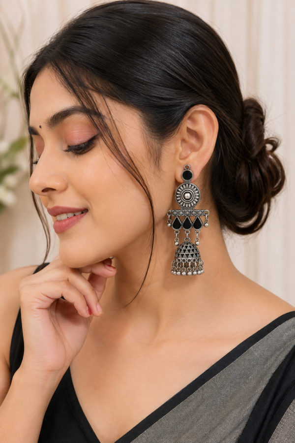 Oxidised silver jhumka earrings with dangling round accents