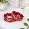 Traditional Maroon Lac Bangles Traditional maroon lac bangles with golden floral-inspired design
