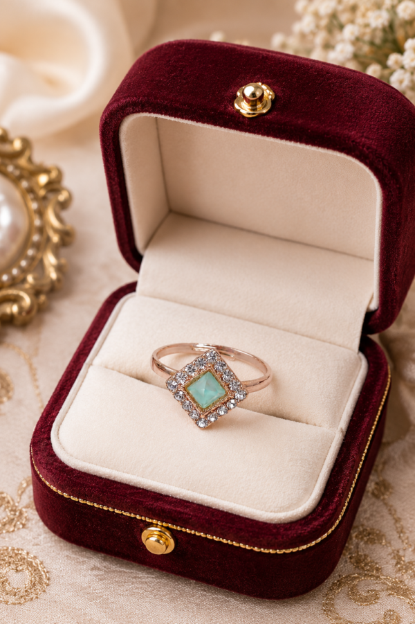 Green Square Stone Designer Ring Green square stone designer ring with sparkling-looking decorative detailing