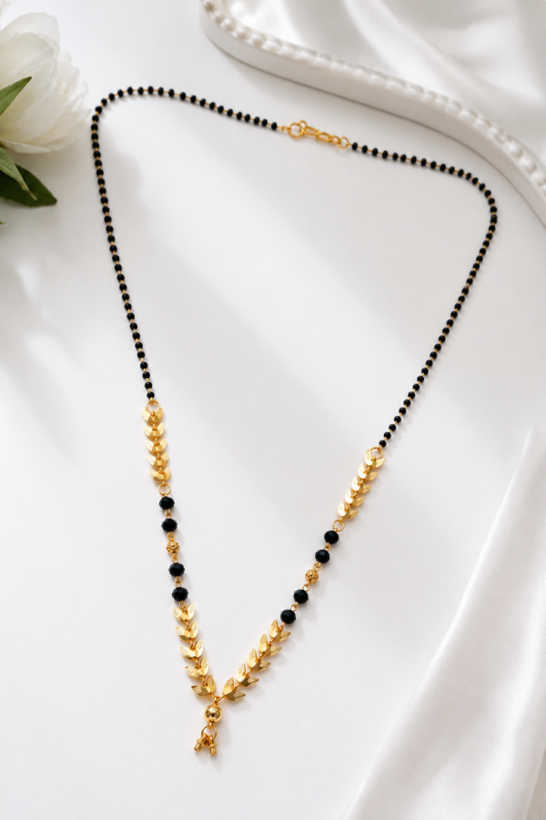 da3f0a45-7183-4f56-ac92-d616f160c5ed Black Beaded Mangalsutra for Women – Elegant Gold-Tone Design