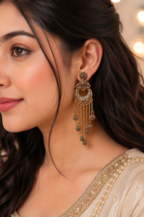 Traditional gold tone earrings with multiple hanging beads