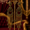 Long ethnic beaded earrings with ornate openwork design