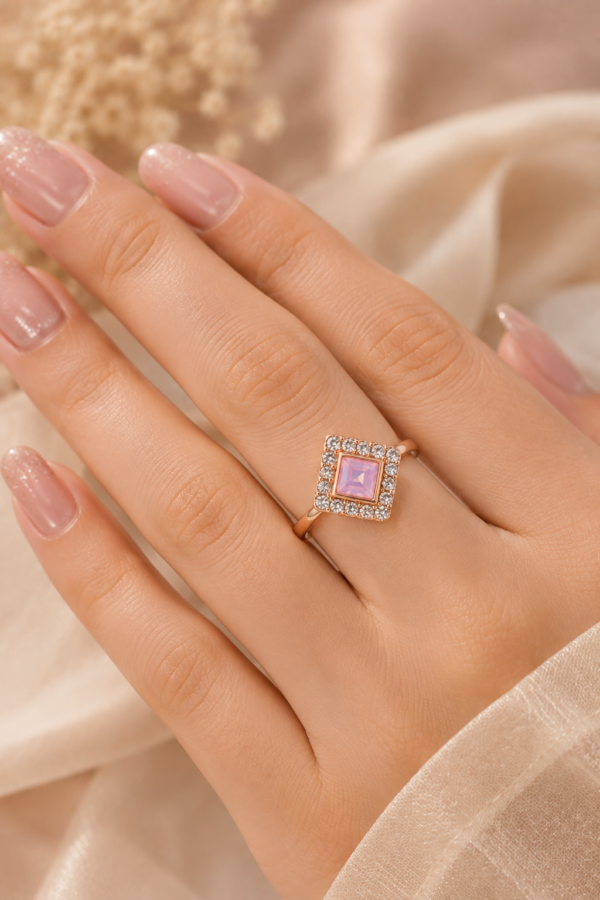 Geometric pink centre ring with clear stone-style border