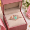 Heart Design Ring with Clear Stone Halo Heart design ring with clear stone border and warm-toned band