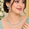 Pearl necklace set with matching white pearl-style drop earrings