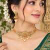 Traditional green and gold necklace set with pearl-style detailing