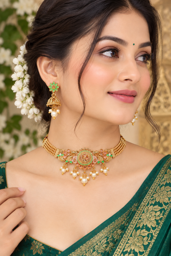 Traditional green and gold necklace set with pearl-style detailing