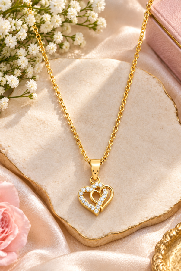 Double heart pendant necklace on neckline