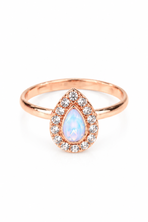Teardrop stone ring with blue pink centre and clear stone halo