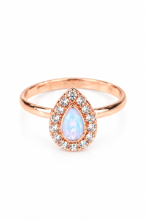 Teardrop Stone Ring with Blue Pink Centre Teardrop stone ring with blue pink centre and clear stone halo