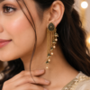 Gold Tone Pearl Drop Earrings Gold tone pearl drop earrings with cascading chains