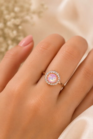 Rose Gold Tone Pink Stone Ring Rose gold tone pink stone ring with clear crystal-style accents